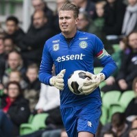 A forma masculina do goleiro do clube de futebol Groningen 2016/2017 (conjunto: T-shirt + calções + leggings)